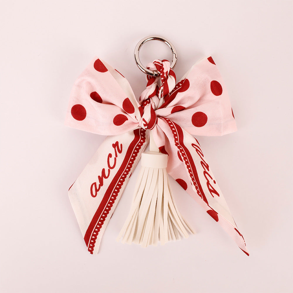 Elegant scarf bow detail for a handbag