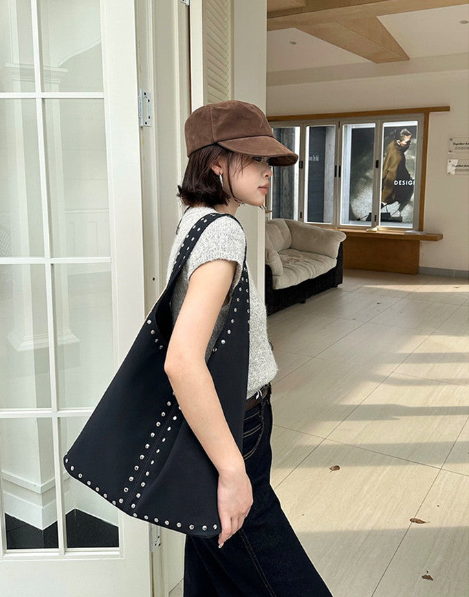 A practical shape for carrying personal items on weekends.