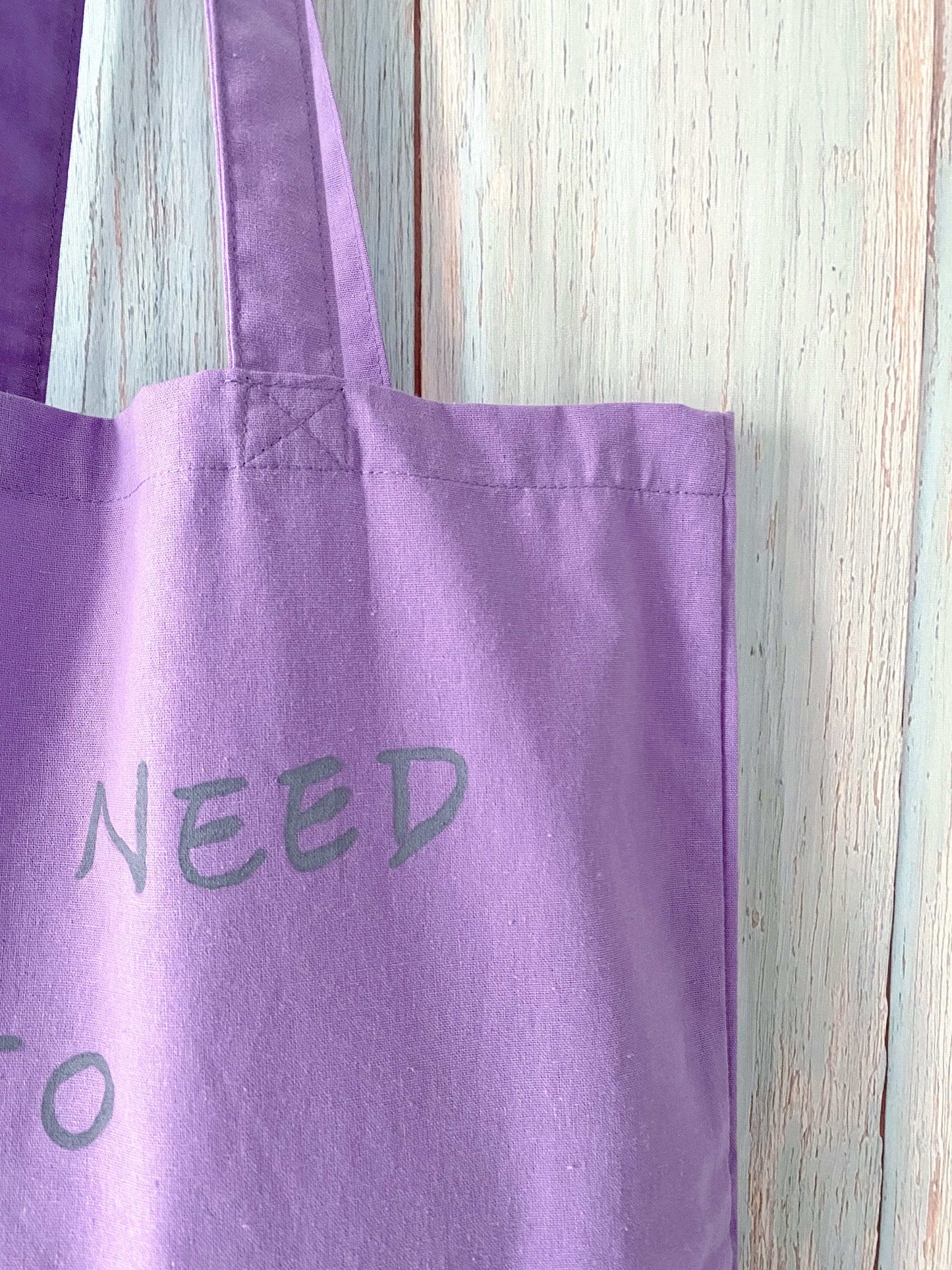 minimalist purple cotton bag with hand-written quote