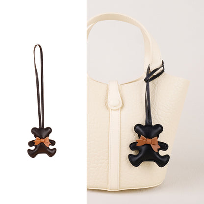 Thoughtful holiday stocking stuffer idea featuring a handmade bear purse charm