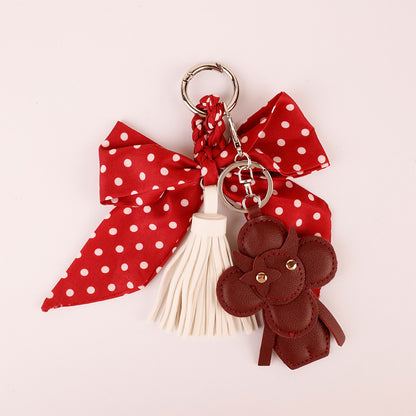 Red bow bag decoration for someone who loves unique accessories