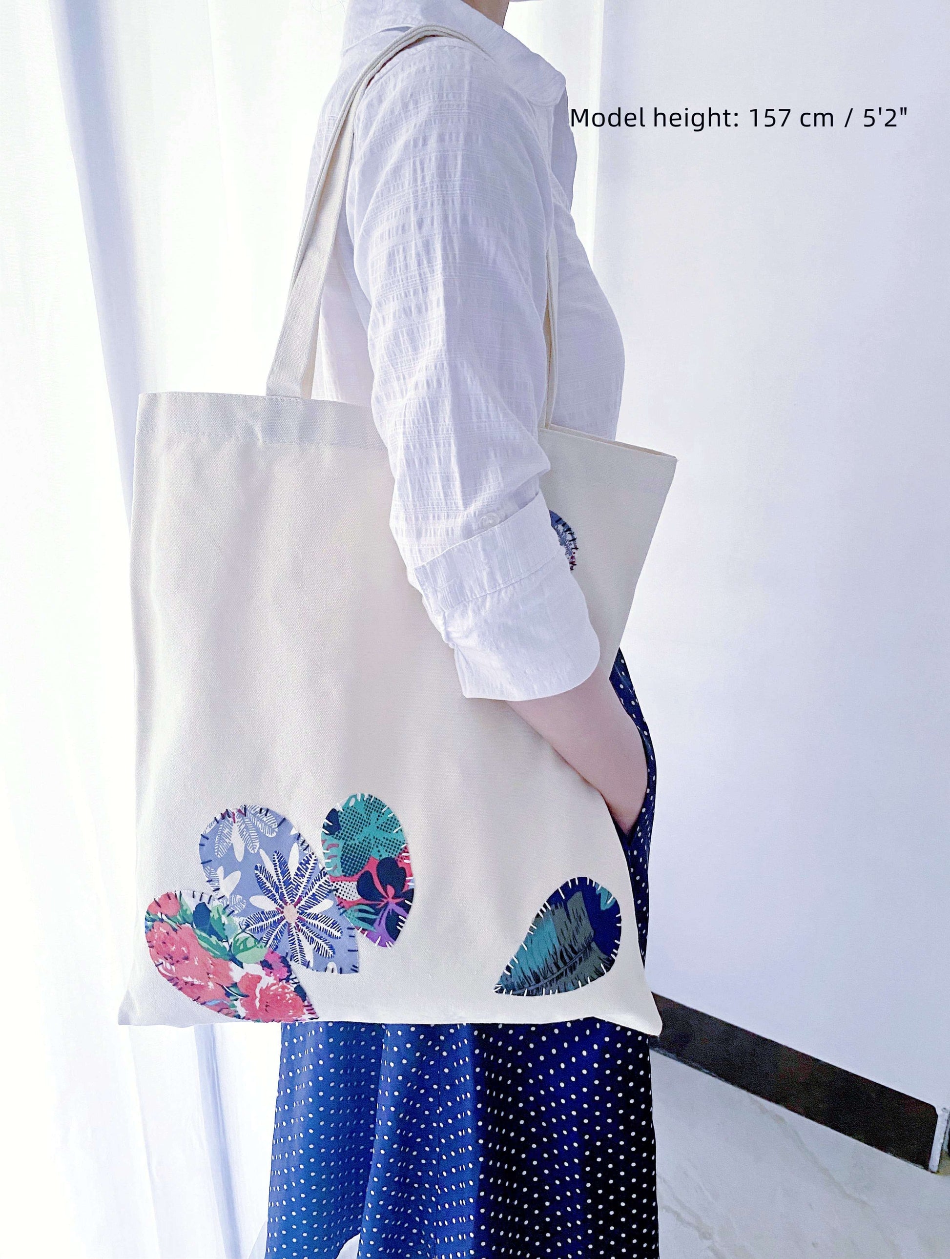 This large canvas tote makes a thoughtful gift for anyone who embraces eco-friendly living, offering plenty of room for all their essentials while supporting sustainable fashion.