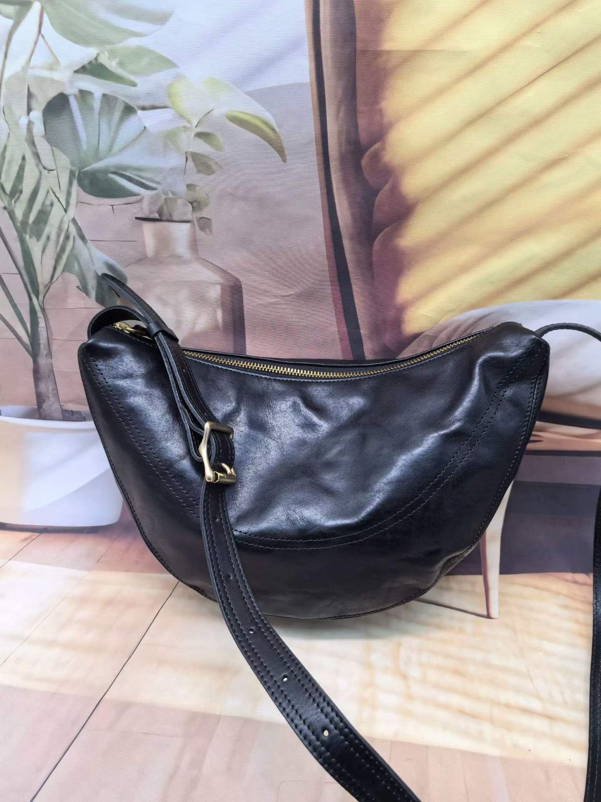 Small leather sling purse for walks and relaxed afternoons