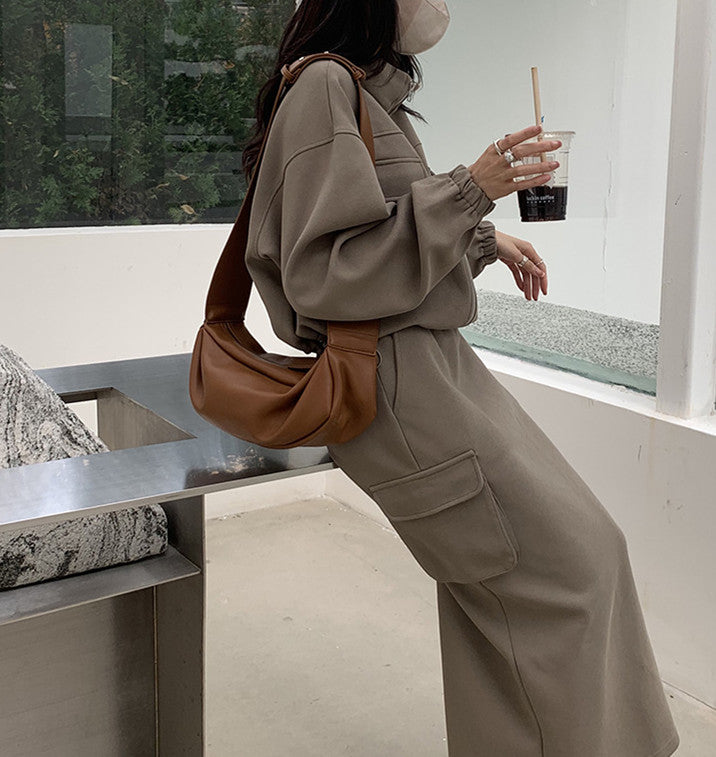 Soft unstructured hobo bag with spacious compartment for daily essential storage