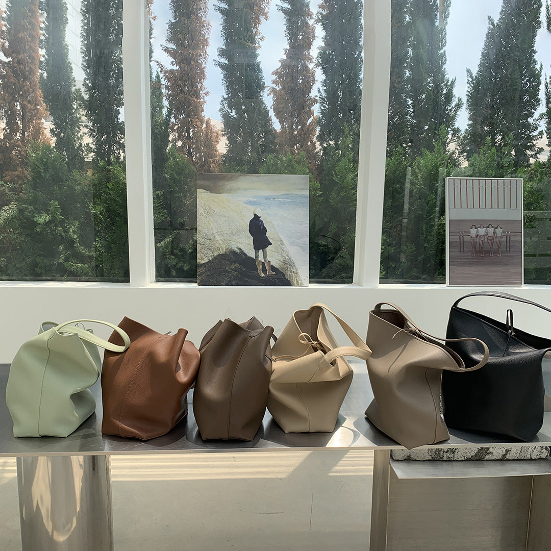 Soft leather tote-style bucket bag for daily use