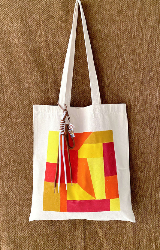 relaxed cotton canvas tote bag carried through a calm city street