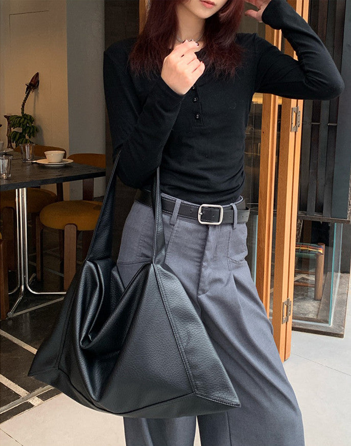Roomy shoulder bag for light travel days