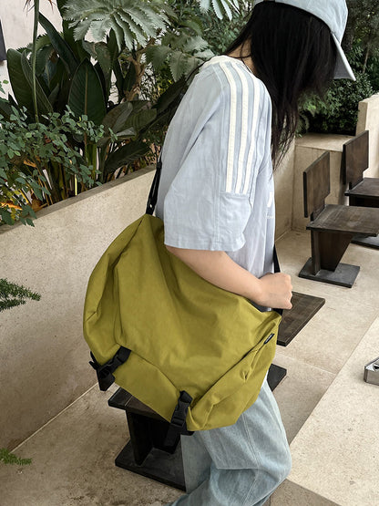 Spacious messenger style bag for short getaways