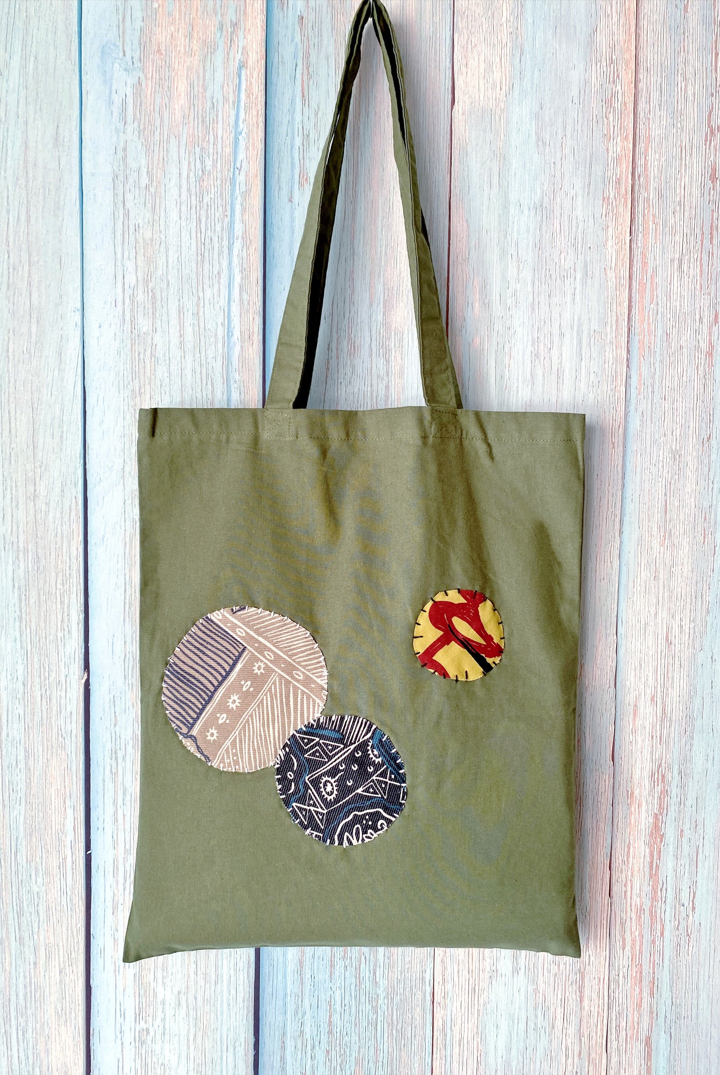 Relaxed style tote, essential accessory for unique fashion layering.