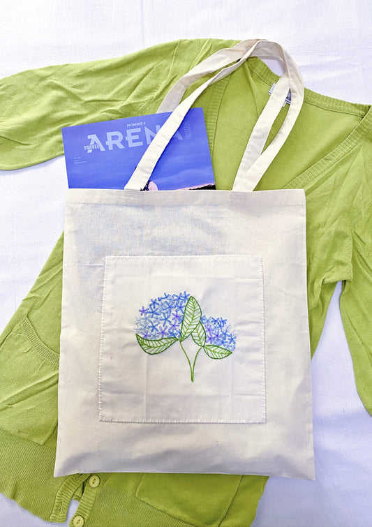 Large capacity travel tote designed for lovers of quiet luxury and comfort.