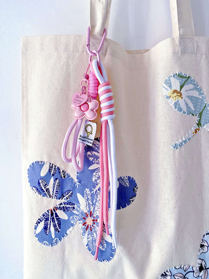 soft everyday bag leaning against a wall in a quiet afternoon corner