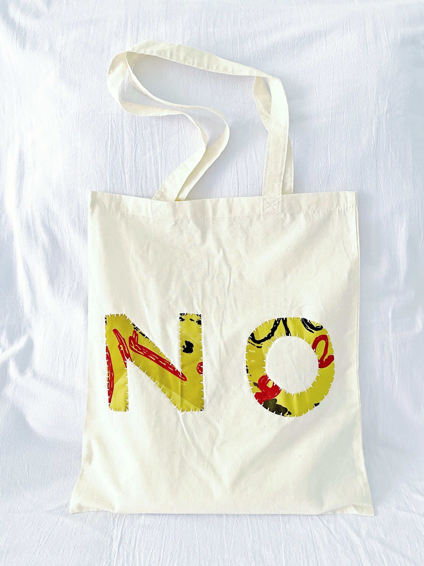 Oversized patchwork bag, ideal graduation gift for students.