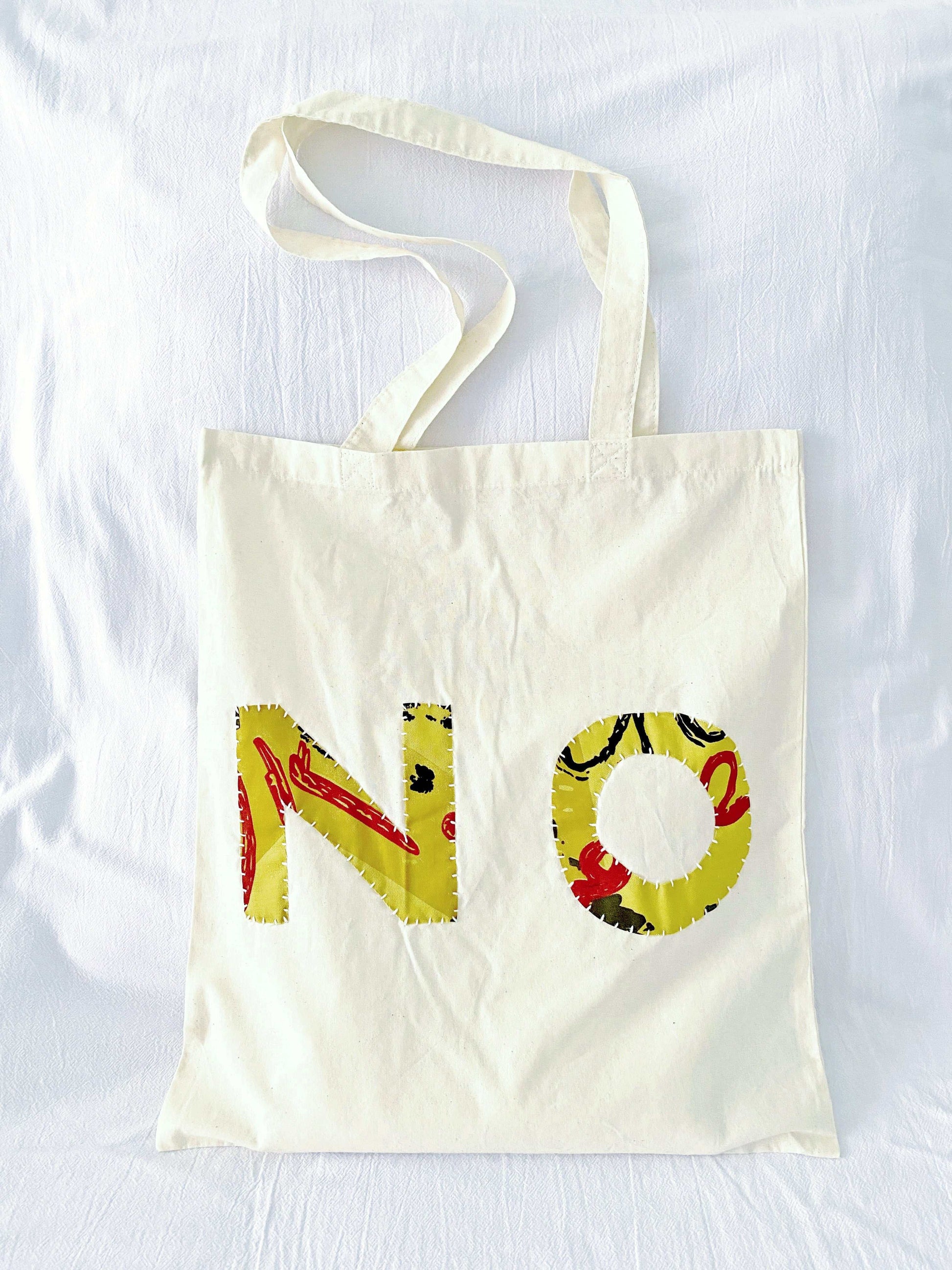 Oversized patchwork bag, ideal graduation gift for students.