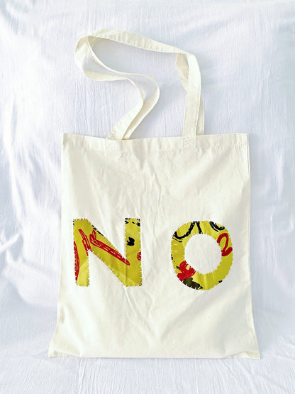 Oversized patchwork bag, ideal graduation gift for students.