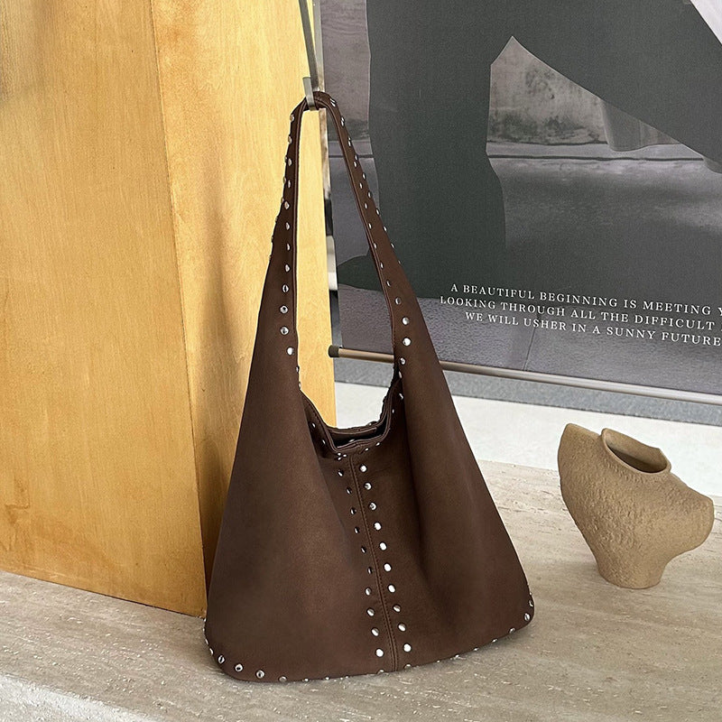 Useful space for books, small purchases, and personal essentials.