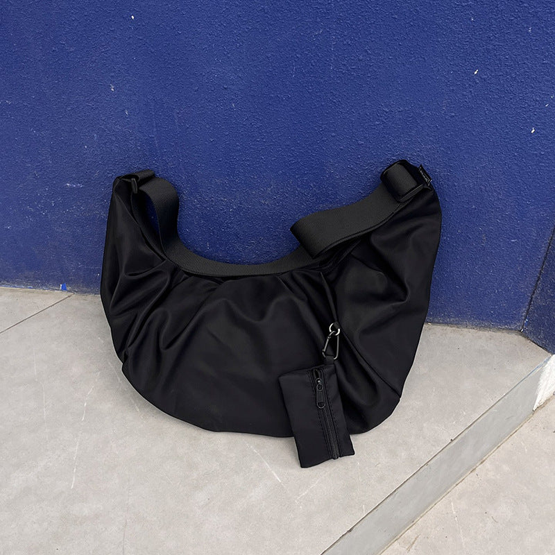 Half-moon shaped bag for shopping and errands