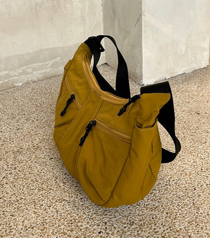 Women's sling bag for carrying essentials while traveling