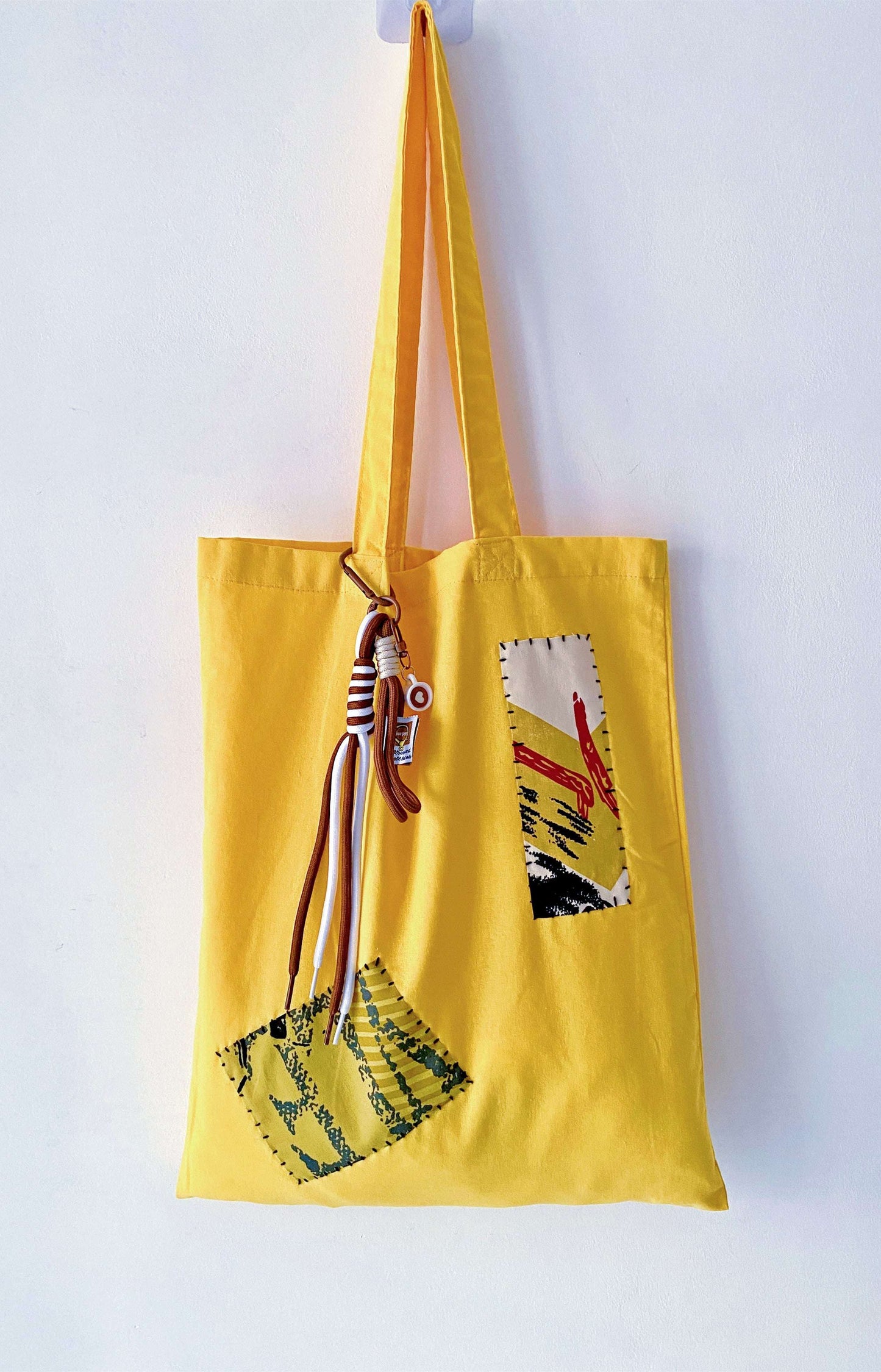 minimal fabric bag placed on a wooden table with morning light