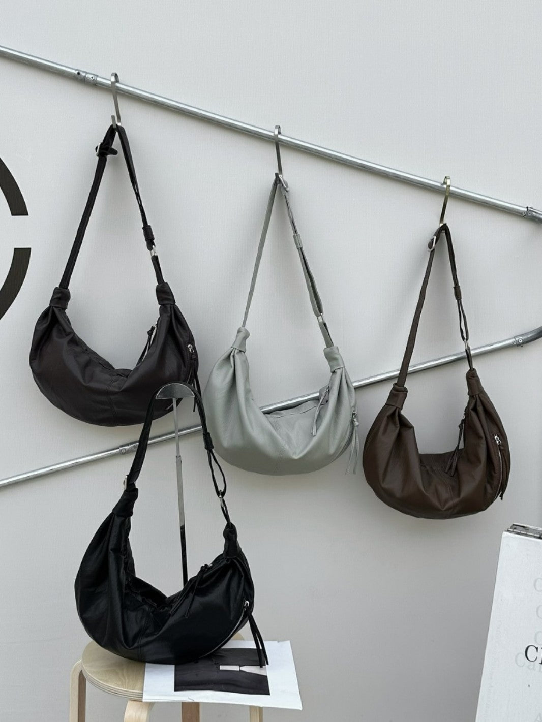 Soft-shaped handbag for leisurely afternoon walks.