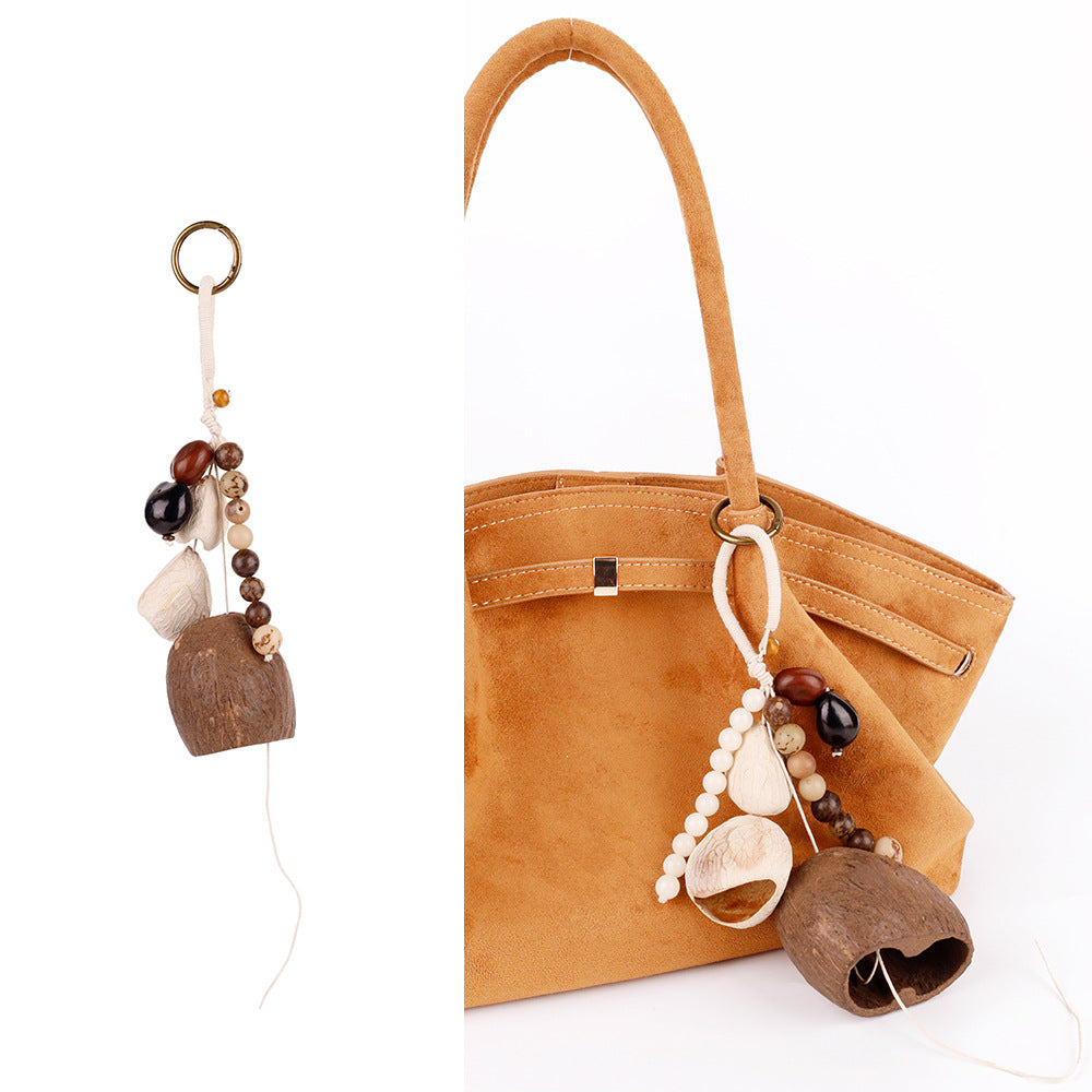 Small handmade bag accessory with bodhi seeds