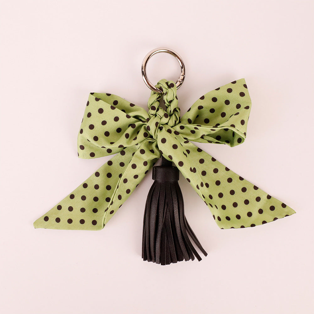 Vintage bow decoration for a leather handbag