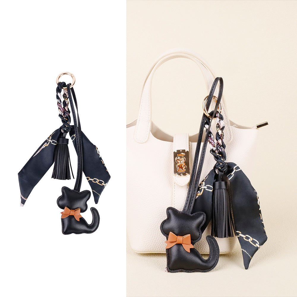 Cat charm accessory for refreshing a favorite bag