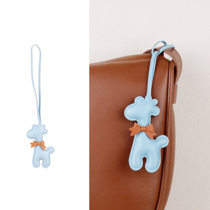 Small gift accessory featuring a giraffe and tassel