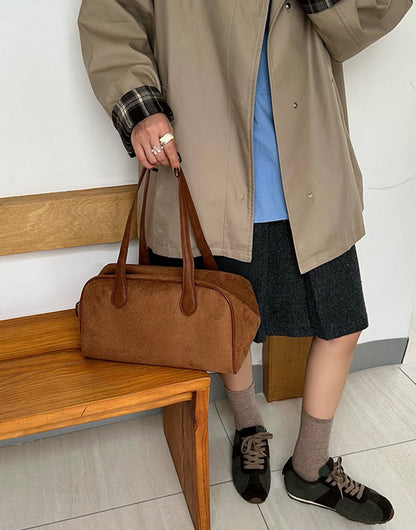 Dual carry handbag for shopping and coffee stops
