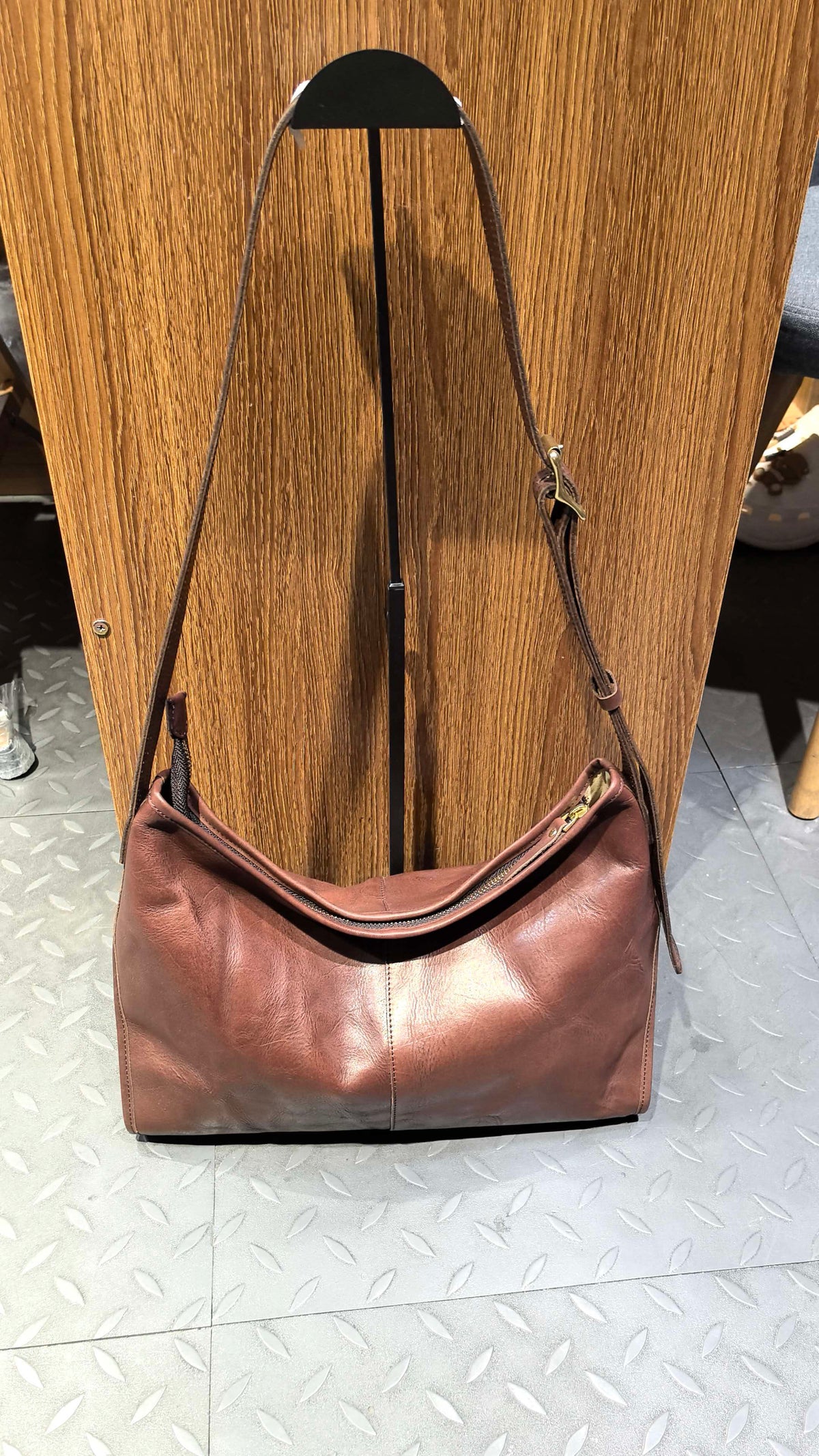 Wide strap shoulder bag designed for comfortable daily carrying