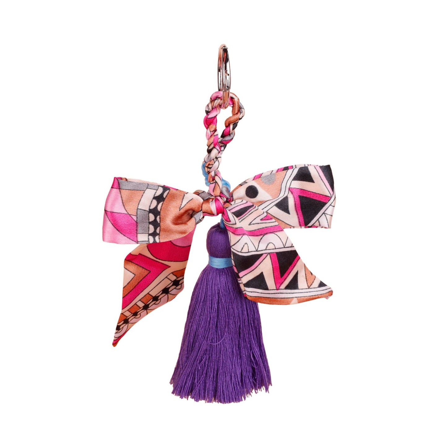Artisan bow tassel accessory adding style to a structured handbag