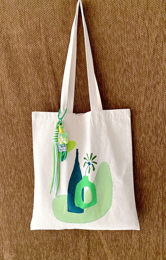 foldable tote bag in cotton canvas tucked inside another bag