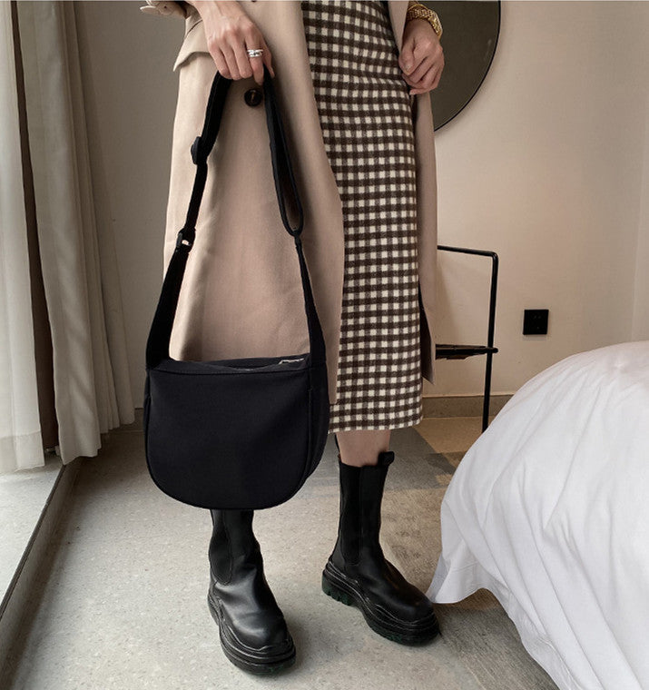 Compact women's bag for carrying daily essentials