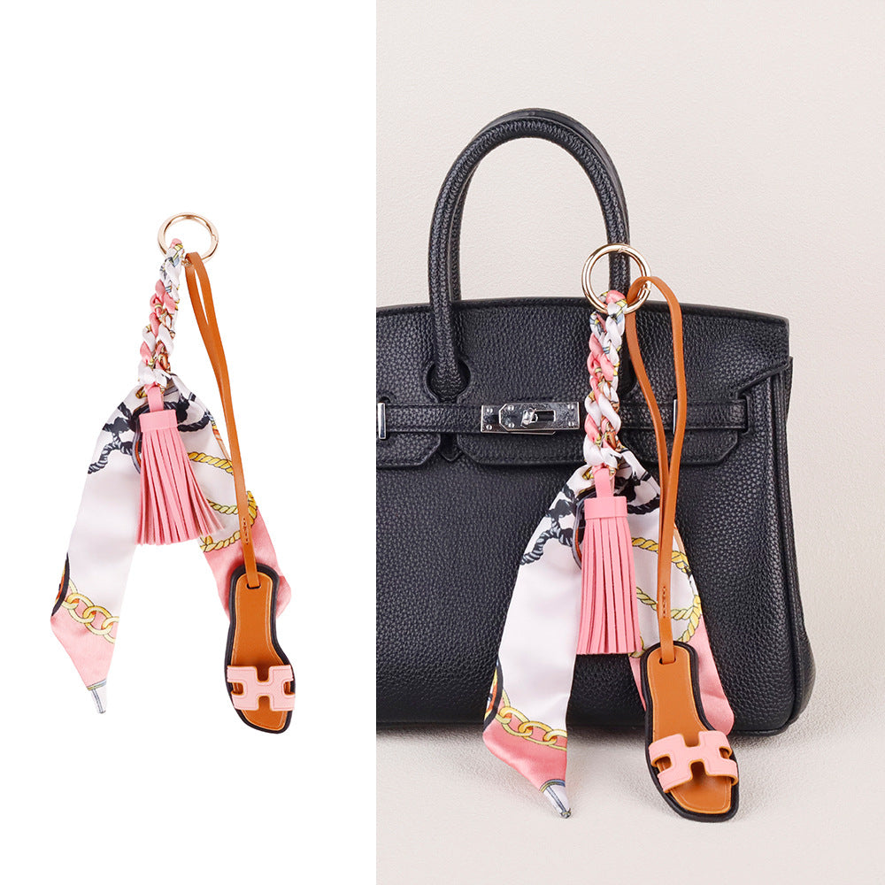 Shoe motif bag charm with soft scarf tassel