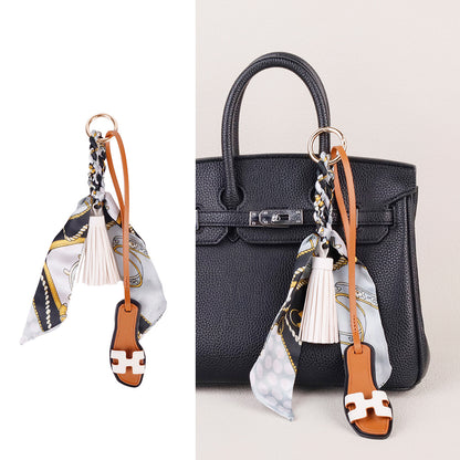 Small purse accessory with slipper shaped design