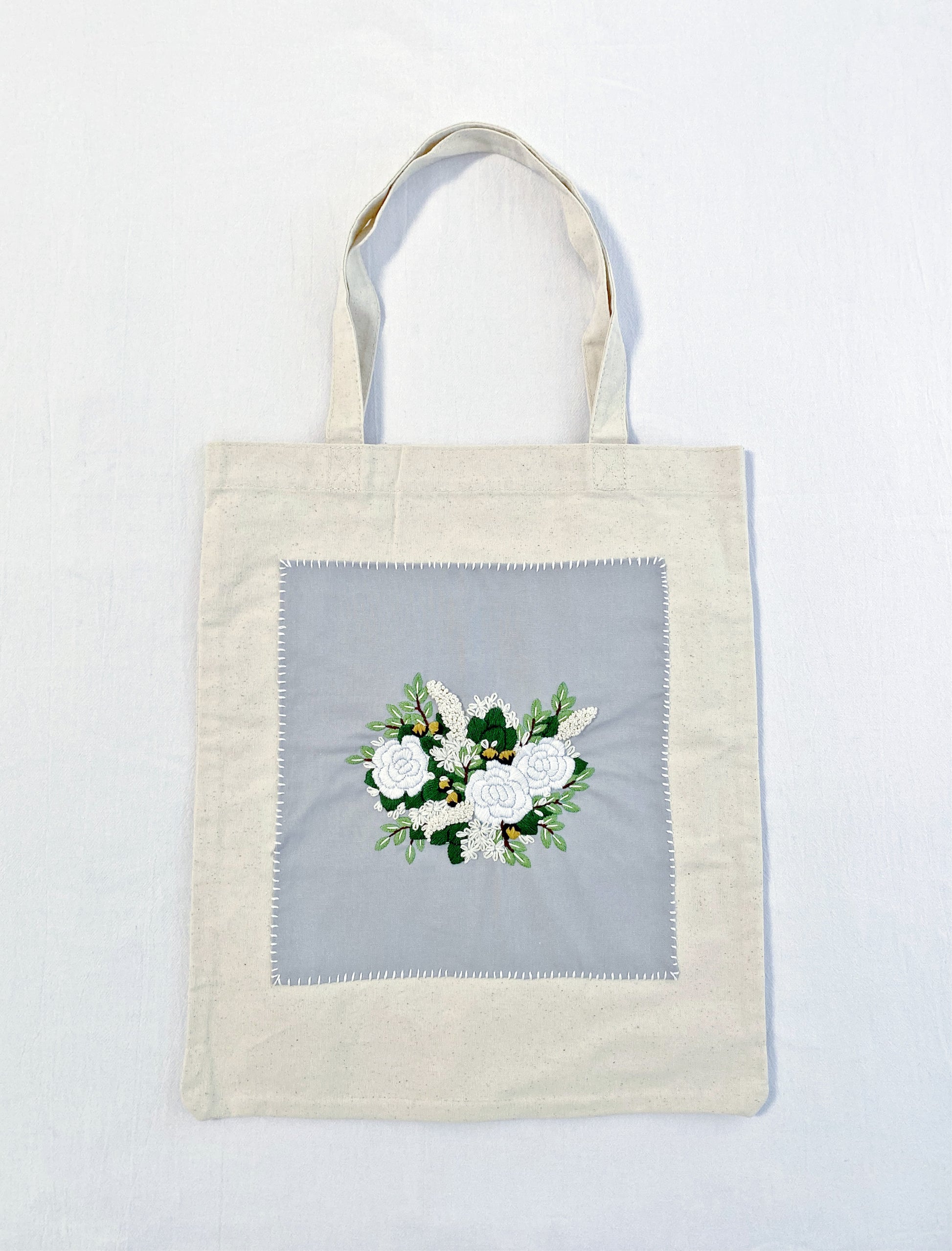 roomy floral embroidered canvas shopping bag for weekend getaways