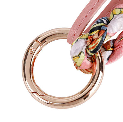Decorative charm styled with a backpack for everyday use
