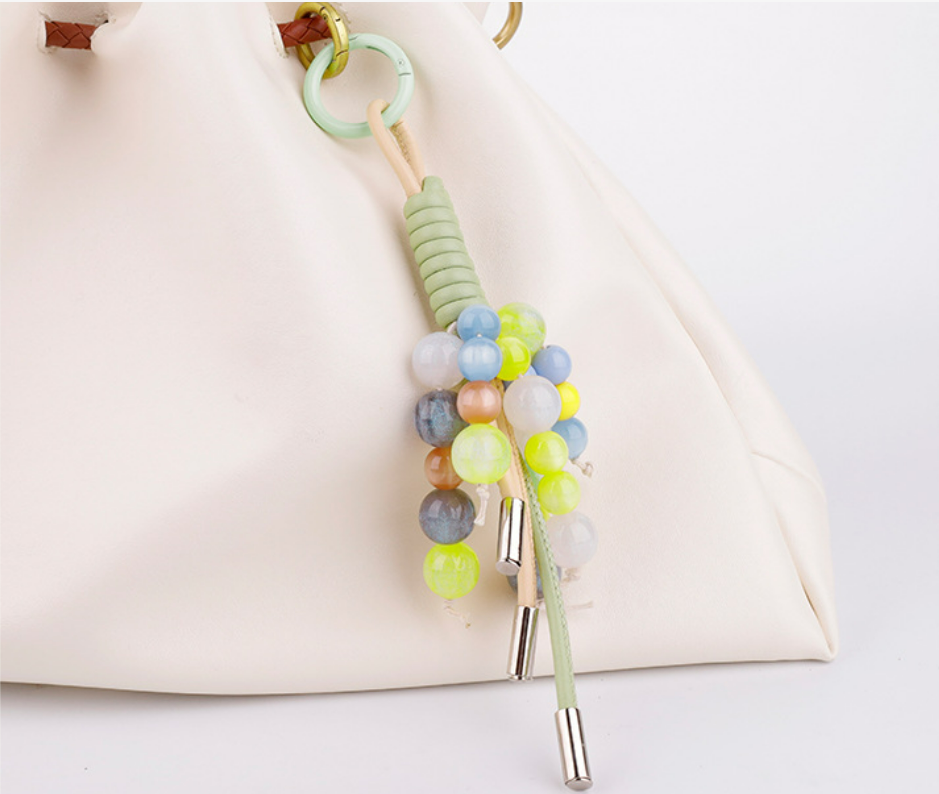 Fresh green bag decoration with stone beads and tassels