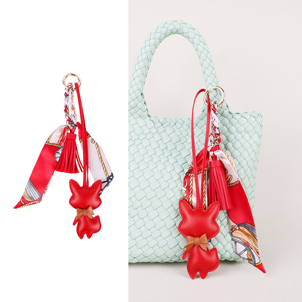 Fox accessory arranged beside a gift box for a personal present