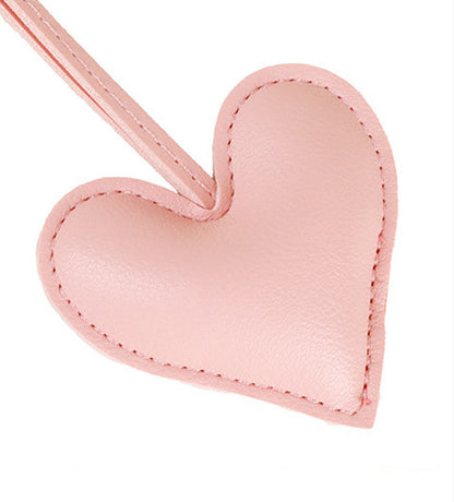 Handmade bag charm with heart and tassel