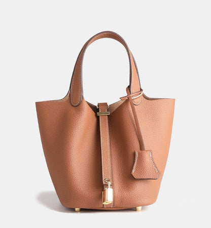 lightweight leather bucket handbag suitable for travel and daily errands