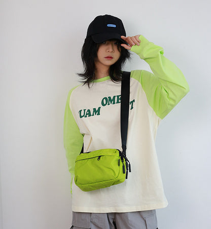 Compact everyday bag worn across the body for hands-free movement