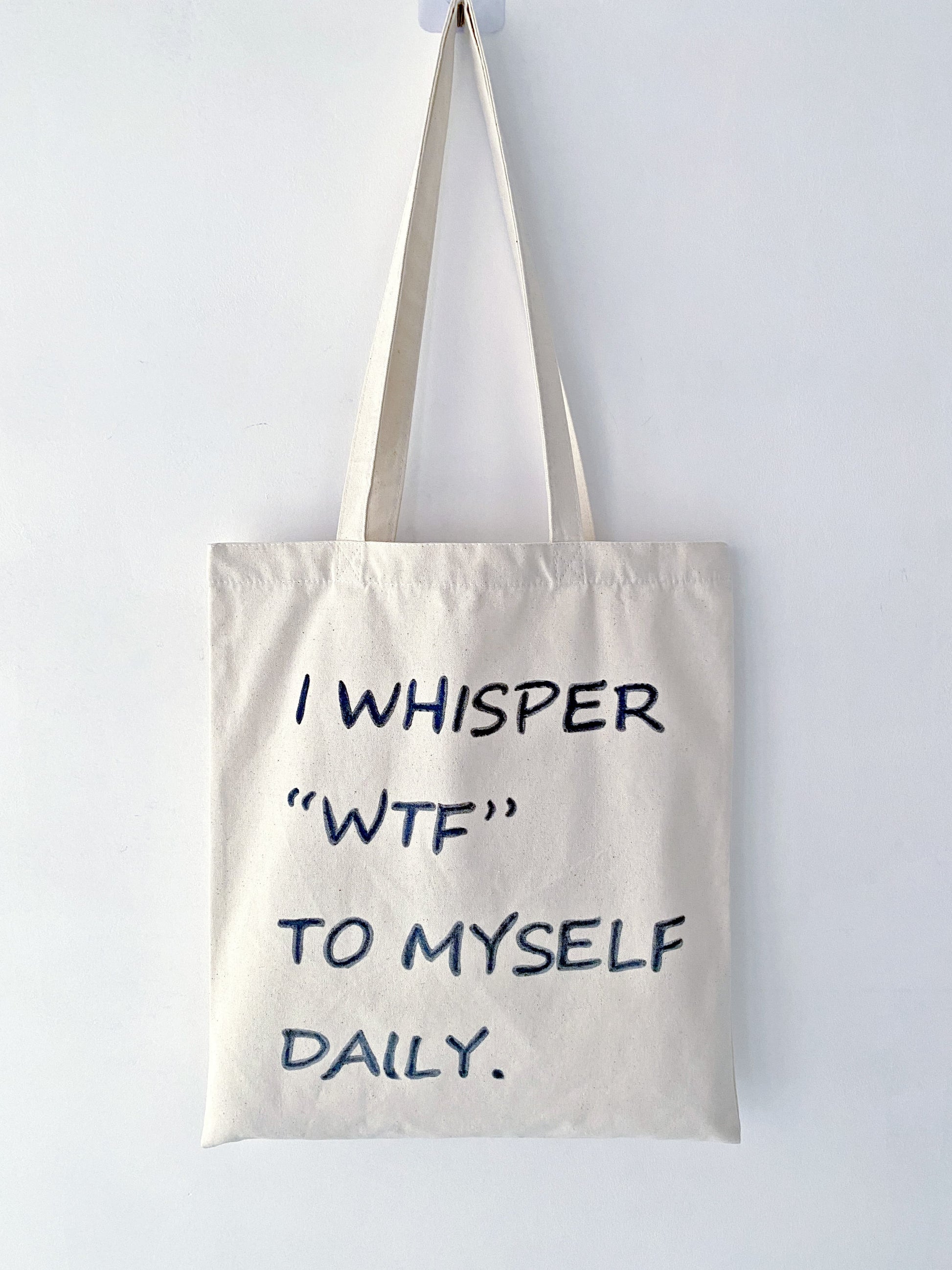 natural canvas bag with hand-drawn phrase for sustainable fashion