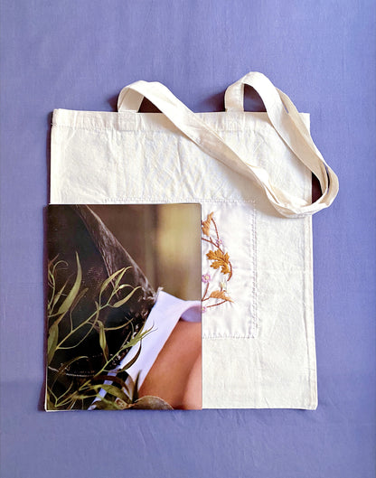 Whether for shopping or a day out, this eco-friendly cotton tote with hand embroidery is a stylish and sustainable choice.