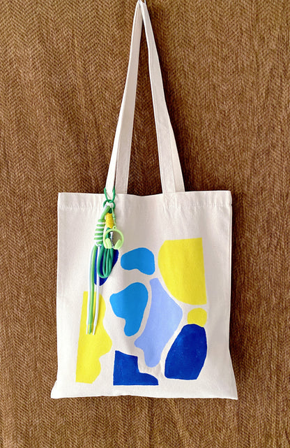 Canvas tote bag placed on a kitchen table for daily essentials and relaxed morning routine