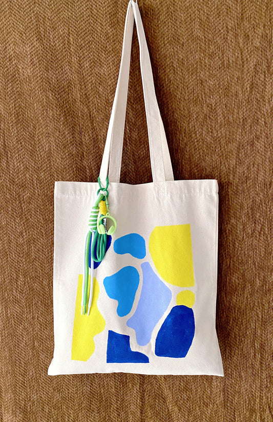 Canvas tote bag placed on a kitchen table for daily essentials and relaxed morning routine