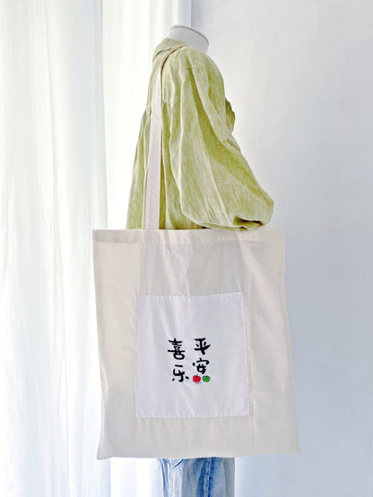 large capacity cotton shopping bag with embroidery detail