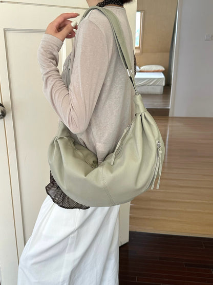 Spacious crossbody purse for hands-free market visits.
