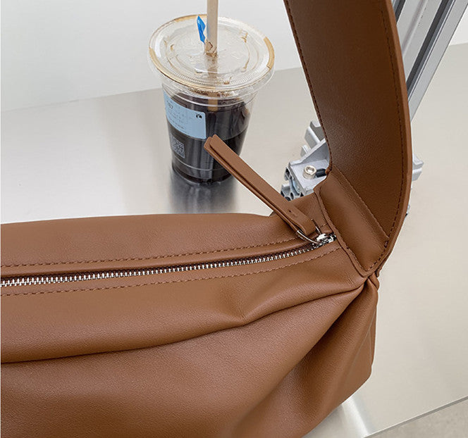 Compact everyday crossbody bag with wide strap for petite and tall women