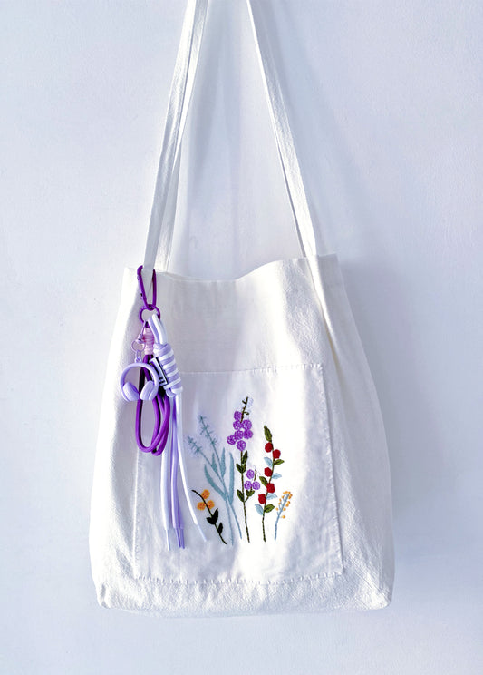 floral stitched shoulder bag ideal for birthdays or quiet celebrations