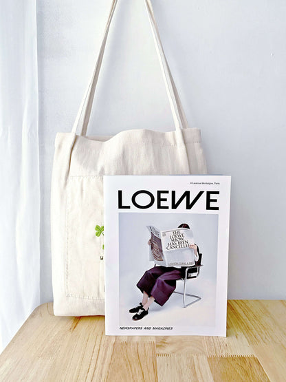 Hand-embroidered cotton-linen tote with nature-inspired floral design – a great gift for your loved ones.